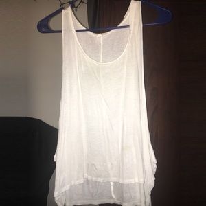 White top with low cut sides